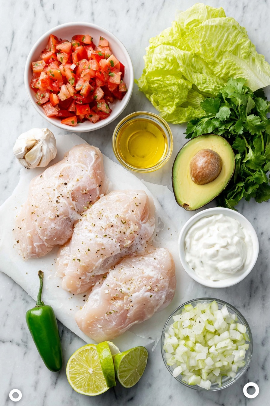 Flat lay of boneless, skinless raw chicken breasts, two cloves of garlic with papery skins, a small white bowl of golden olive oil, a fresh medium tomato diced into cubes, a quarter cup of finely diced white onion, one whole jalapeño pepper, a small bunch of loosely packed green cilantro leaves, half a ripe avocado diced, eight vibrant green Romaine lettuce leaves, one whole uncracked lime, a small white bowl of creamy white Greek yogurt, placed on a clean white marble surface, soft natural light, photo taken with an iPhone, professional food photography style, fresh ingredients, white ceramic bowls, no bottles, no duplicates, no utensils, no packaging --ar 2:3 --v 7 --p awthu7i m7354615311229779997