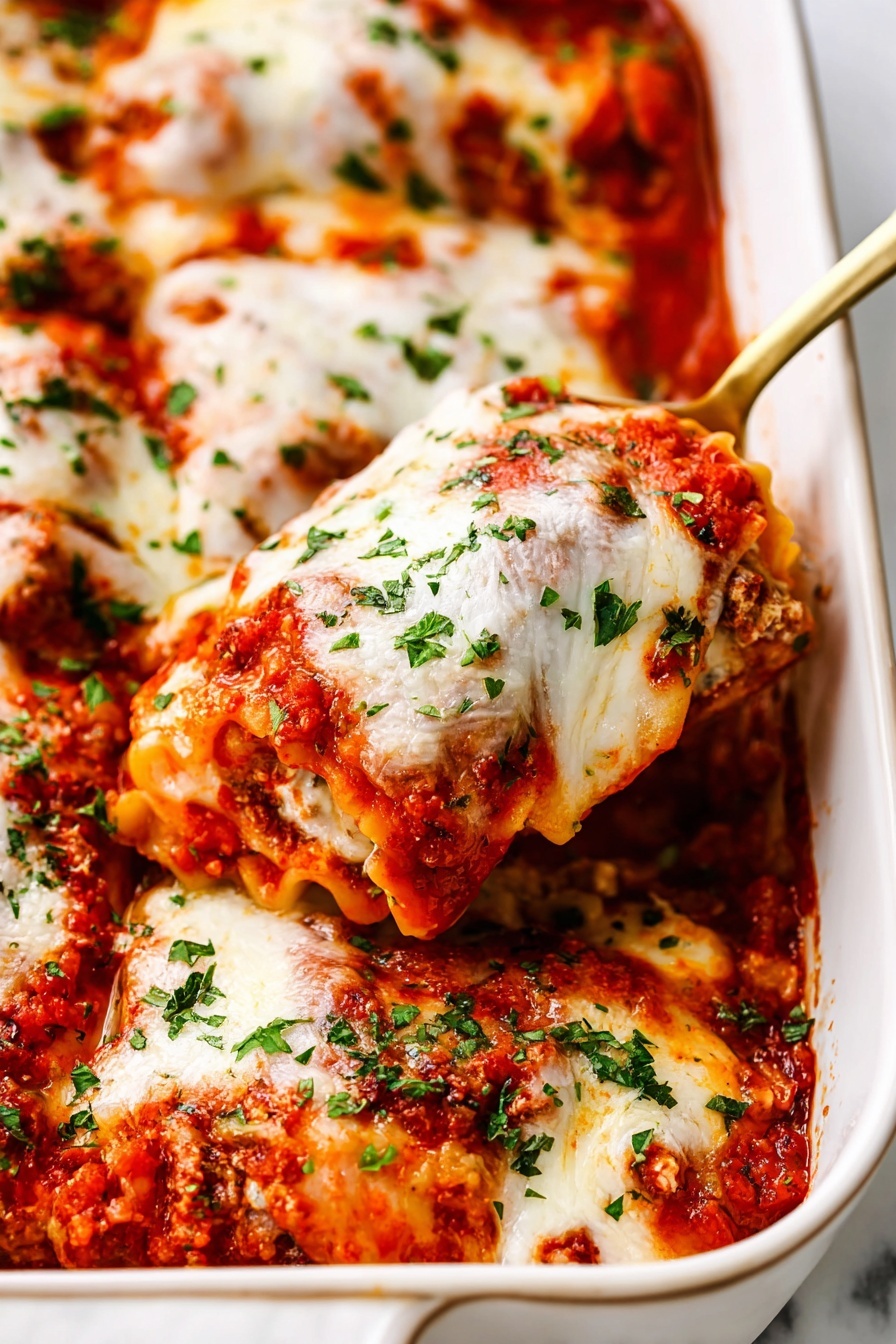 This image shows a close-up of a white dish filled with rich lasagna made of three visible layers: the bottom layer is wide, wavy pasta noodles with a light yellow color; the middle layer consists of chunky red tomato sauce mixed with brown ground meat; the top layer is thick, melted white cheese sprinkled with bright green chopped herbs. The dish looks hot and gooey, with some cheese stretching as a serving spoon lifts a portion from the dish. The background has a white marbled texture. photo taken with an iphone --ar 2:3 --v 7