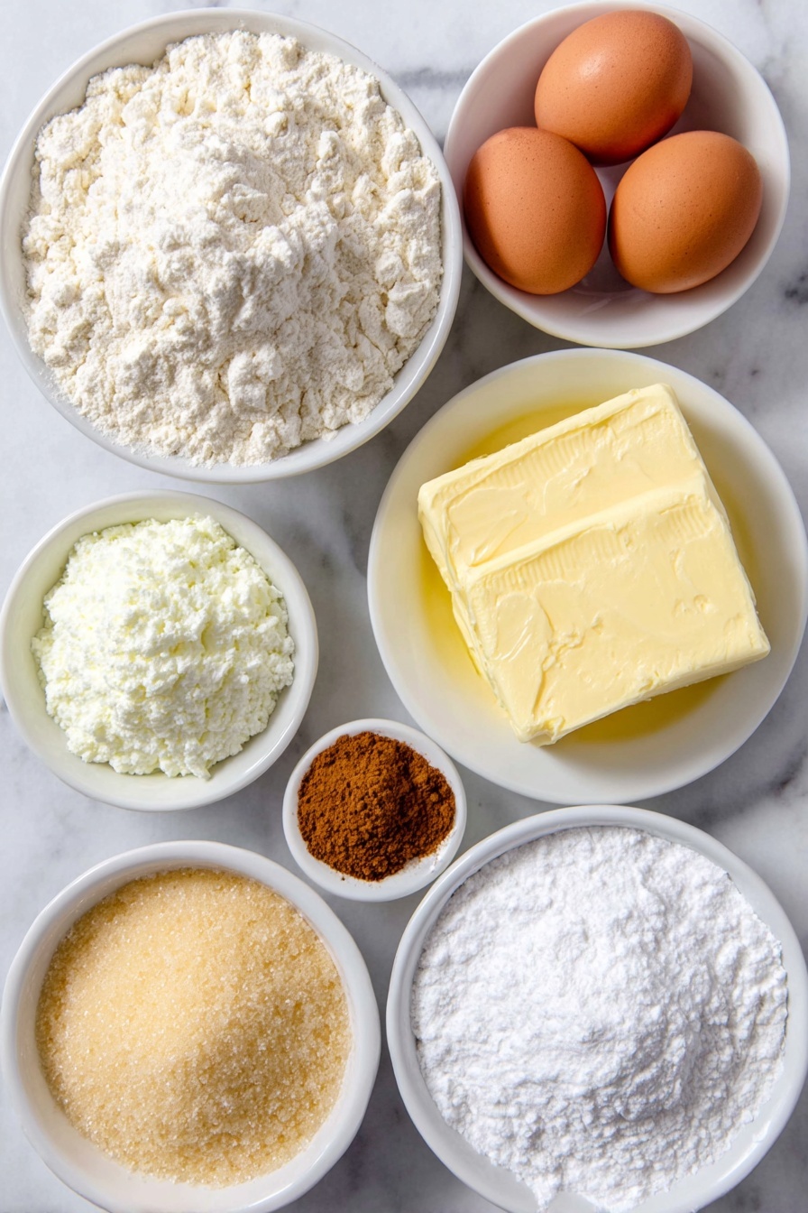 Flat lay of a small mound of all-purpose flour in a simple white ceramic bowl, a few tablespoons of powdered milk in a small white bowl, a little heap of cream of tartar powder on a white ceramic plate, a small pile of baking soda powder on a white plate, a generous square of salted butter with smooth surface, two whole uncracked large brown eggs, a small white ceramic bowl filled with golden light brown sugar, another small white bowl with fine white granulated sugar, a shallow white bowl holding ground cinnamon powder, and a small white bowl of clear vanilla extract, all arranged symmetrically and balanced on a clean white marble surface, soft natural light, photo taken with an iPhone, professional food photography style, fresh ingredients, white ceramic bowls, no bottles, no duplicates, no utensils, no packaging --ar 2:3 --v 7 --p m7354615311229779997
